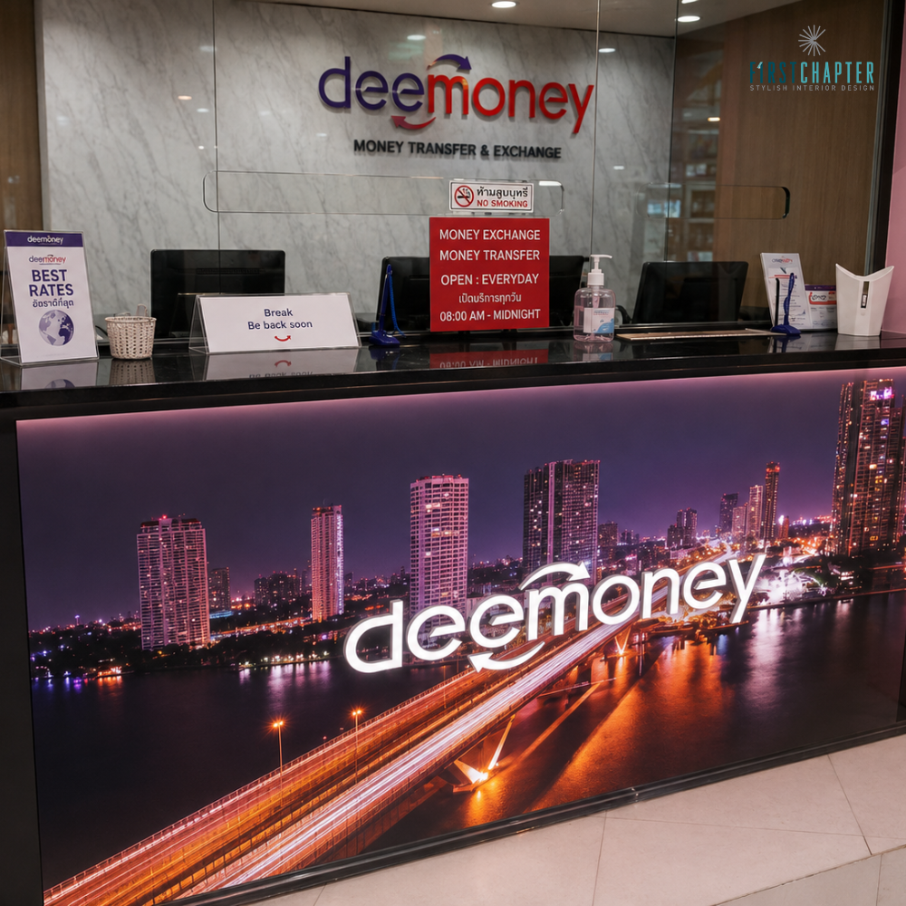 Counter front display showing night cityscape with deemoney logo, marble-look wall and clear partition behind