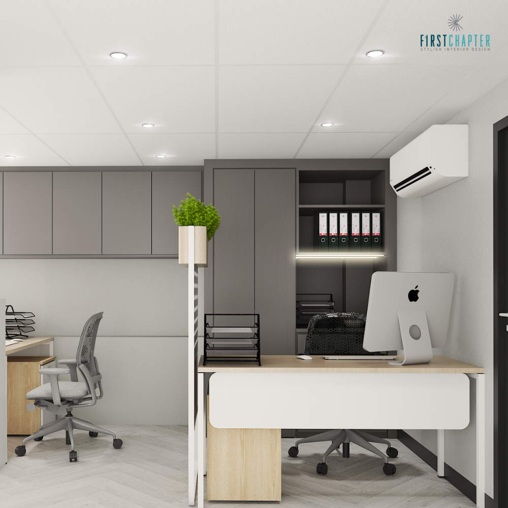 Office desk with grey overhead cabinets, tall built-in cabinet with binders and LED strip, iMac and herringbone wood-look flooring